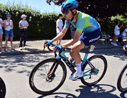 French Clement Champoussin of XDS Astana Team pictured in action during stage eight of the 2025 Tour de France cycling, from Saint-Meen-le-Grand to Laval Espace Mayenne (174 km), on Saturday 12 July 2025 in France. The 112th edition of the Tour de France starts on Saturday 5 July in Lille, France, and will finish in Paris, France on the 27th of July. POOLxxPOOLxPETExGODING  x128971305x