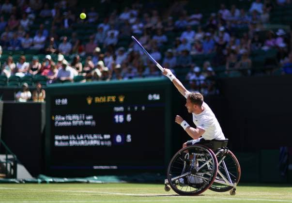 Wimbledon Championships 2025 AELTC, Day Thirteen, London, UK - 12 07 2025 Alfie Hewett (GBR) partnered with Gordon Reid (GBR) in action during the Mens Wheelchair DoublesFinal against Martin De La Puente (ESP) and Ruben Spaargaren (NED) in the 2025 Wimbledon Championships London Wimbledon London GBR, UK NEWSPAPERS OUT Copyright: xMarkxGreenwoodx