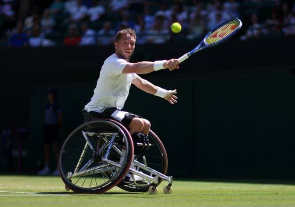 Wimbledon Championships 2025 AELTC, Day Thirteen, London, UK - 12 07 2025 Alfie Hewett (GBR) partnered with Gordon Reid (GBR) in action during the Mens Wheelchair DoublesFinal against Martin De La Puente (ESP) and Ruben Spaargaren (NED) in the 2025 Wimbledon Championships London Wimbledon London GBR, UK NEWSPAPERS OUT Copyright: xMarkxGreenwoodx