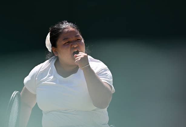 (250712) -- LONDON, July 12, 2025 -- Wang Ziying celebrates victory after the women s wheelchair singles final between Wang Ziying of China and Kamiji Yui of Japan at the Wimbledon Tennis Championships in London, Britain, July 12, 2025. ) (SP)BRITAIN-LONDON-WHEELCHAIR TENNIS-WIMBLEDON-WOMEN S SINGLES-FINAL LixYing 