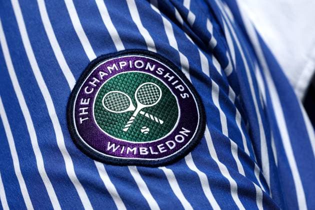 12th July 2025; All England Lawn Tennis and Croquet Club, London, England; Wimbledon Tennis Tournament, Day 13; The Championships Wimbledon crest on the left shoulder of a line judge  ActionPlus12812524 JohnxPatrickxFletcher