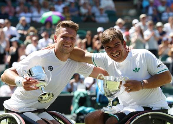 12th July 2025; All England Lawn Tennis and Croquet Club, London, England; Wimbledon Tennis Tournament, Day 13; Martin De La Puente (ESP) and Ruben Spaargaren (NED) pose with the Gentlemen& x2019;s Wheelchair trophy after defeating Alfie Hewett (GBR) and Gordon Reid (GBR) on Court Number One in their men s wheelchair doubles final  ActionPlus12812526 JohnxPatrickxFletcher