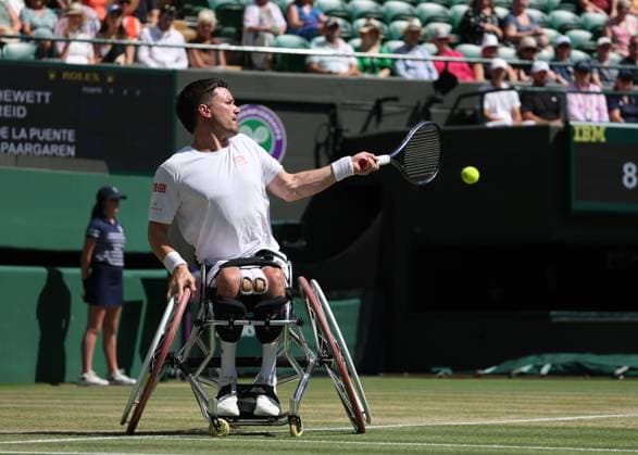 12th July 2025; All England Lawn Tennis and Croquet Club, London, England; Wimbledon Tennis Tournament, Day 13; Gordon Reid (GBR) with a forehand shot to Ruben Spaargaren (NED) in their men s wheelchair doubles final  ActionPlus12812501 JohnxPatrickxFletcher