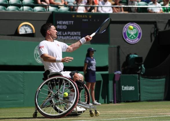 12th July 2025; All England Lawn Tennis and Croquet Club, London, England; Wimbledon Tennis Tournament, Day 13; Gordon Reid (GBR) with a forehand shot to Ruben Spaargaren (NED) in their men s wheelchair doubles final  ActionPlus12812502 JohnxPatrickxFletcher