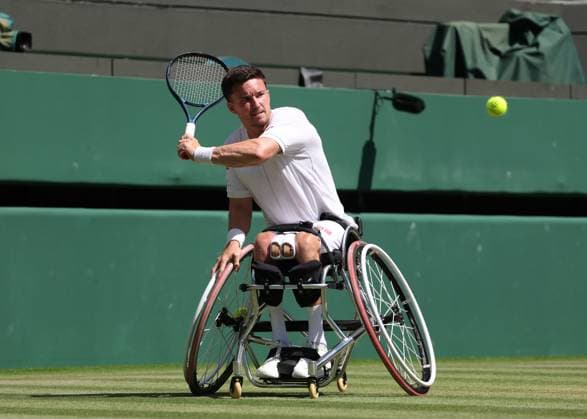 12th July 2025; All England Lawn Tennis and Croquet Club, London, England; Wimbledon Tennis Tournament, Day 13; Alfie Hewett (GBR) with a backhand shot to Ruben Spaargaren (NED) in their men s wheelchair doubles final  ActionPlus12812507 JohnxPatrickxFletcher