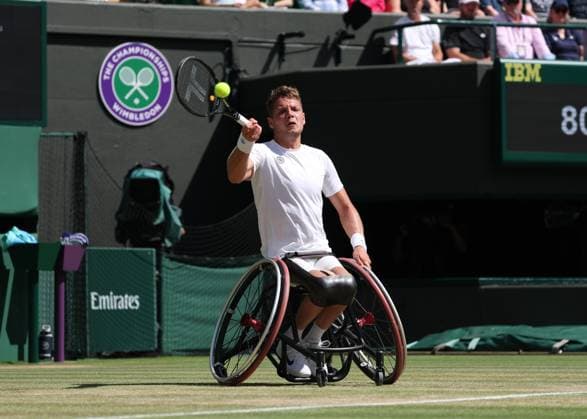 12th July 2025; All England Lawn Tennis and Croquet Club, London, England; Wimbledon Tennis Tournament, Day 13; Ruben Spaargaren (NED) with a forehand shot to Alfie Hewett (GBR) in their men s wheelchair doubles final  ActionPlus12812509 JohnxPatrickxFletcher