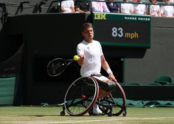 12th July 2025; All England Lawn Tennis and Croquet Club, London, England; Wimbledon Tennis Tournament, Day 13; Ruben Spaargaren (NED) with a forehand shot to Alfie Hewett (GBR) in their men s wheelchair doubles final  ActionPlus12812511 JohnxPatrickxFletcher