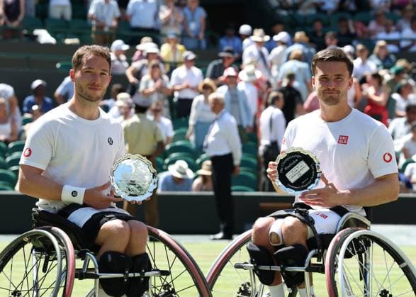 12th July 2025; All England Lawn Tennis and Croquet Club, London, England; Wimbledon Tennis Tournament, Day 13; Alfie Hewett (GBR) and Gordon Reid (GBR) pose with runner-up plates after losing to Martin De La Puente (ESP) and Ruben Spaargaren (NED) in their men s wheelchair doubles final  ActionPlus12812530 JohnxPatrickxFletcher