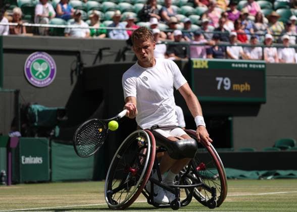 12th July 2025; All England Lawn Tennis and Croquet Club, London, England; Wimbledon Tennis Tournament, Day 13; Ruben Spaargaren (NED) with a forehand shot to Alfie Hewett (GBR) in their men s wheelchair doubles final  ActionPlus12812514 JohnxPatrickxFletcher