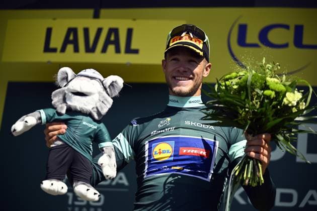 Italian Jonathan Milan of Lidl-Trek celebrates on the podium in the green points jersey after stage eight of the 2025 Tour de France cycling, from Saint-Meen-le-Grand to Laval Espace Mayenne (174 km), on Saturday 12 July 2025 in France. The 112th edition of the Tour de France starts on Saturday 5 July in Lille, France, and will finish in Paris, France on the 27th of July. JASPERxJACOBS  x128983684x