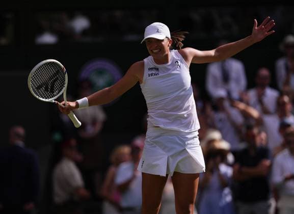 Iga Swiatek of Poland celebrates after winning the Ladies Singles Final on day thirteen of The Championships Wimbledon 2025 at All England Lawn Tennis and Croquet Club on July 12, 2025 in London, England.  Copyright: xHiroshixSatox
