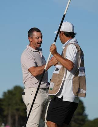 Rory McIlroy (NIR) shakes hands with his caddie Harry Diamond on the 18th green as he finishes 11 under par after the 3rd Round of the Genesis Scottish Open Golf Championship. Genesis Scottish Open, Day 3, Golf, Renaissance Club, North Berwick, Scotland, UK - 12 Jul 2025North Berwick Scotland United Kingdom EDITORIAL USE ONLY No use with unauthorised audio, video, data, fixture lists, club league logos or live services. Online in-match use limited to 120 images, no video emulation. No use in betting, games or single club league player publications. Copyright: xStuartxWallace Shutterstockx 15393029hf