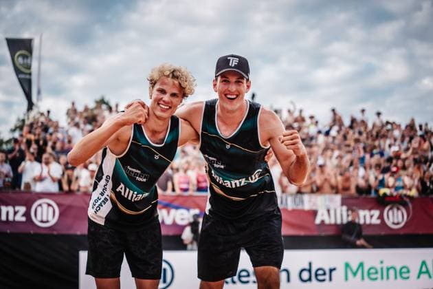 Beach volleyball men Allianz German Beach Tour 2025 Tourstop Munich 12 07 2025 f l Tamo Wüst and Tristan Fröbel cheer after the victory Munich Central University Sports Munich Bavaria Germany