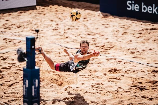 Beach volleyball men Allianz German Beach Tour 2025 Tourstop Munich 12 07 2025 Eric Stadie Seeber jumps to the ball Munich Central University Sports Munich Bavaria Germany
