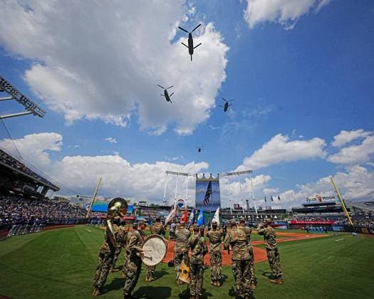 July 12, 2025: Army Band from Ft. Leonard wood performs the national Anthem as Chinook Helicopters from Ft. Leavenworth fly over before the Royals against the Mets game on salute to Armed services day at Kauffman Stadium Kansas City, Missouri. CSM. Kansas City United States - ZUMAc04_ 20250712_zma_c04_104 Copyright: xJonxRobichaudx