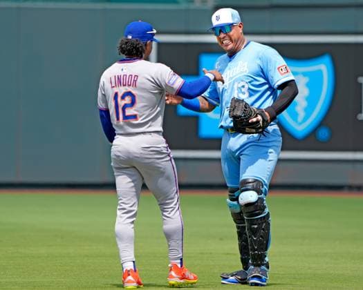 July 12, 2025: Kansas City Royals catcher Salvador Perez (13) and New York Mets shortstop Francisco Lindor (12) enjoy some pregame conversation at Kauffman Stadium Kansas City, Missouri. CSM. Kansas City United States - ZUMAc04_ 20250712_zma_c04_109 Copyright: xJonxRobichaudx