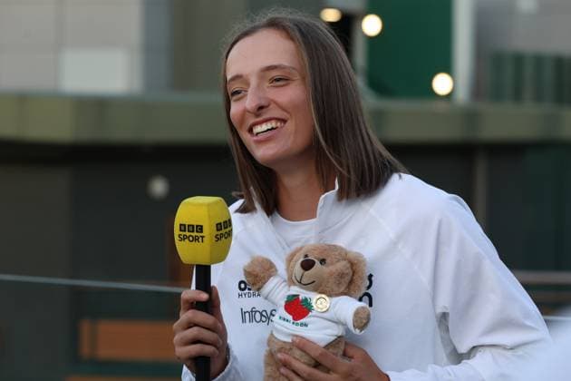 July 12, 2025, London, England: IGA SWIATEK, 24 of Poland celebrates the winning of final Tennis superstar Swiatek becomes champion of the 2025 All England Club, after thrashing 6-0, 6-0 American Anisimova, 23. Historic day, as her first Wimbledon win, and first women™s final at the tournament in 114 years in which one player failed to claim a single game. It seems, said Swiatek, who is now unbeaten and 6-0 in major title matches, super surreal. after routing the 13th-seeded, USA s Anisimova, in her first Slam final on a sunny, breezy Saturday on Centre Court. I was a bit frozen there, with my nerves. Maybe the last two weeks I got a bit tired or something, said Anisimova, who skipped practice on Friday because of fatigue and felt pain in her right shoulder while warming up before the match. London United Kingdom - ZUMAc278 20250713_zsp_c278_002 Copyright: xMarcinxCholewinskix