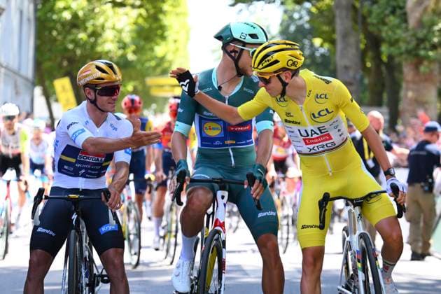 Tour de France 2025 Stage 9 CHATEAUROUX, FRANCE - JULY 13 : Evenepoel Remco (BEL) of Soudal Quick-Step, Pogacar Tadej (SLO) of UAE Team Emirates, Milan Jonathan (ITA) of Lidl - Trek during stage 9 of the 112th edition of Tour de France an UCI World Tour 2.UWT cycling road race stage for Men Elite of 170 km with start in Chinon and finish in Chateauroux on July 13, 2025 in Chateauroux, France, 13 07 2025 ( Motordriver Kenny Verfaillie - Chateauroux France  Copyright: xVincentxKalutx