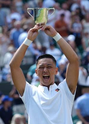 Tennis - 2025 Wimbledon Championships - Mens singles Wheelchair Final - Alfie Hewitt (GBR) v Tokito Oda (Japan) All England Lawn Tennis & Croquet Club - Sunday 13th July 2025 Tokito Oda (Japan) with the trophy 