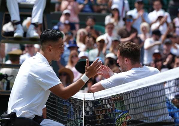 Tennis - 2025 Wimbledon Championships - Mens singles Wheelchair Final - Alfie Hewitt (GBR) v Tokito Oda (Japan) All England Lawn Tennis & Croquet Club - Sunday 13th July 2025 Tokito Oda (Japan) at the net after the match with Alfie 