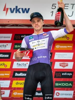 CYCLING - Tour of Austria 2025 FELDKIRCH,AUSTRIA,13.JUL.25 - CYCLING - Tour of Austria, stage 5, Feldkirch - Feldkirch. Image shows Emanuel Zangerle (AUT Team Vorarlberg) with the bip for the most active rider of the tour.  GEPAxpictures xOliverxLerch