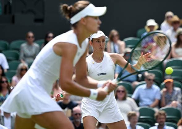 (250713) -- LONDON, July 13, 2025 -- Veronika Kudermetova Elise Mertens (R) compete during the women s doubles final between Hsieh Su-Wei (Chinese Taipei) Jelena Ostapenko (Latvia) and Veronika Kudermetova (Russia) Elise Mertens (Belgium) at the Wimbledon Tennis Championships in London, Britain, July 13, 2025. ) (SP)BRITAIN-LONDON-TENNIS-WIMBLEDON-WOMEN S DOUBLES-FINAL LixYing 