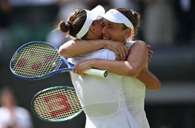 (250713) -- LONDON, July 13, 2025 -- Veronika Kudermetova Elise Mertens (R) celebrate victory after the women s doubles final between Hsieh Su-Wei (Chinese Taipei) Jelena Ostapenko (Latvia) and Veronika Kudermetova (Russia) Elise Mertens (Belgium) at the Wimbledon Tennis Championships in London, Britain, July 13, 2025. ) (SP)BRITAIN-LONDON-TENNIS-WIMBLEDON-WOMEN S DOUBLES-FINAL LixYing 