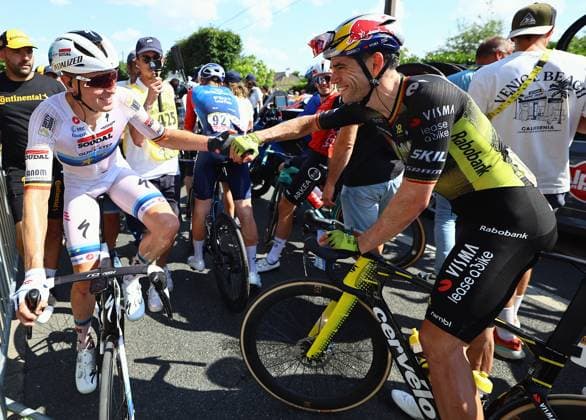 Belgian Tim Merlier of Soudal Quick-Step and Belgian Wout van Aert of Team Visma-Lease a Bike pictured after stage nine of the 2025 Tour de France cycling, from Chinon to Chateauroux (170 km), on Sunday 13 July 2025 in France. The 112th edition of the Tour de France starts on Saturday 5 July in Lille, France, and will finish in Paris, France on the 27th of July. DAVIDxPINTENS  x129084532x