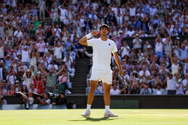 Carlos Alcaraz puts his finger to his ear during the Gentlemen s Singles final Wimbledon Tennis Championships, Day 14, The All England Lawn Tennis and Croquet Club, London, UK - 13 Jul 2025London The All England Lawn Tennis and United Kingdom  Copyright: xEllaxLing Shutterstockx 15392298s