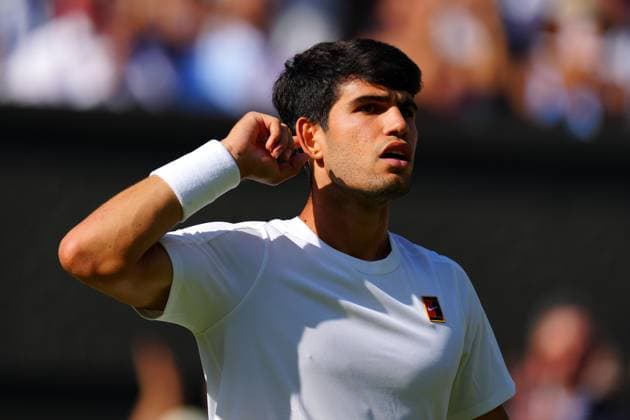 Carlos Alcaraz celebrates during the Gentlemen s Singles final Wimbledon Tennis Championships, Day 14, The All England Lawn Tennis and Croquet Club, London, UK - 13 Jul 2025London The All England Lawn Tennis and United Kingdom  Copyright: xJavierxGarcia Shutterstockx 15392297dm