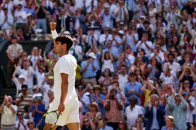 Carlos Alcaraz celebrates during the Gentlemen s Singles final Wimbledon Tennis Championships, Day 14, The All England Lawn Tennis and Croquet Club, London, UK - 13 Jul 2025London The All England Lawn Tennis and United Kingdom  Copyright: xEllaxLing Shutterstockx 15392298aa