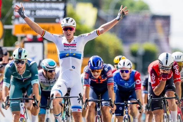 Belgian Tim Merlier of Soudal Quick-Step celebrates as he crosses the finish line to win stage nine of the 2025 Tour de France cycling, from Chinon to Chateauroux (170 km), on Sunday 13 July 2025 in France. The 112th edition of the Tour de France starts on Saturday 5 July in Lille, France, and will finish in Paris, France on the 27th of July. JASPERxJACOBS  x129091579x
