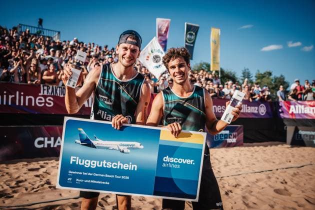 Beach volleyball men Allianz German Beach Tour 2025 Tourstop Munich 13 07 2025 f l Paul Henning and Lui Wüst win the tournament in Munich and celebrate with the trophies Munich Central University Sports Munich Bavaria Germany