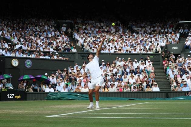 13th July 2025; All England Lawn Tennis and Croquet Club, London, England; Wimbledon Tennis Tournament, Day 14; Carlos Alcaraz (ESP) serves to Jannik Sinner (ITA) in the mens singles final  ActionPlus12813418 JohnxPatrickxFletcher