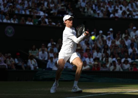 13th July 2025; All England Lawn Tennis and Croquet Club, London, England; Wimbledon Tennis Tournament, Day 14; Jannik Sinner (ITA) with a forehand shot to Carlos Alcaraz (ESP) in the mens singles final  ActionPlus12813435 JohnxPatrickxFletcher