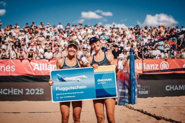 Beach volleyball women Allianz German Beach Tour 2025 Tourstop Munich 13 07 2025 f l Melanie Paul and Lea Kunst celebrate after winning the tournament with the trophies Munich Central University Sports Munich Bavaria Germany