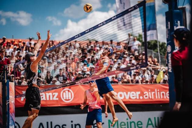 Beach volleyball men Allianz German Beach Tour 2025 Tourstop Munich 13 07 2025 right Tilo Rietschel attacking left Paul Henning Munich Central University Sports Munich Bavaria Germany