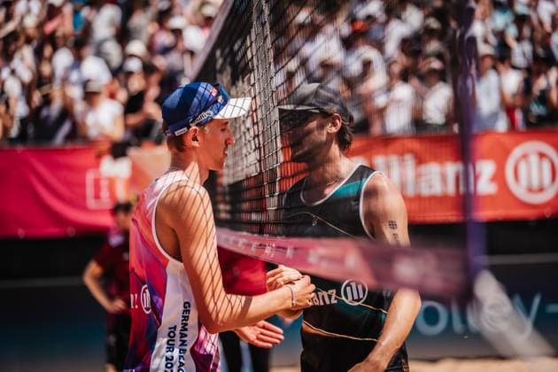 Beach volleyball men Allianz German Beach Tour 2025 Tourstop Munich 13 07 2025 f l Momme Lorenz and Paul Henning shaking hands after the game Munich Central University Sports Munich Bavaria Germany