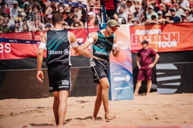 Beach volleyball men Allianz German Beach Tour 2025 Tourstop Munich 13 07 2025 v l Jonas Sagstetter and Benedikt Sagstetter cheer Munich Central University Sports Munich Bavaria Germany