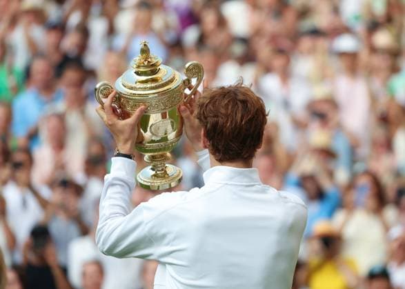 13th July 2025; All England Lawn Tennis and Croquet Club, London, England; Wimbledon Tennis Tournament, Day 14; Jannik Sinner (ITA) lifts the Gentlemen& x2019;s Single Trophy to become the 2025 Wimbledon Gentlemen& x2019;s Single Champion after defeating Carlos Alcaraz (ESP) by 4-6 6-4 6-4 6-4  ActionPlus12813467 JohnxPatrickxFletcher