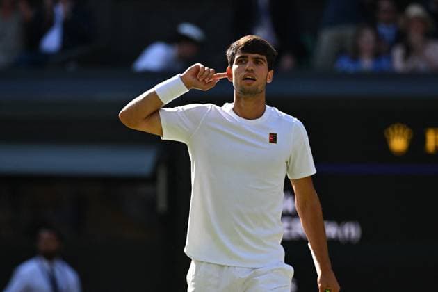 Jannik Sinner Wins His First Wimbledon Trophy - UK Carlos Alcaraz (ESP) during the men final at the 2025 Wimbledon Championships at the AELTC in London, UK, on July 13, 2025. Photo by Corinne Dubreuil ABACAPRESS.COM London United Kingdom  Copyright: xDubreuilxCorinne ABACAx