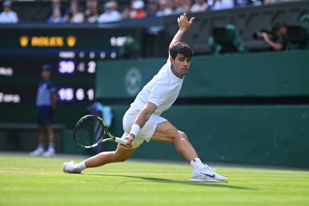 Jannik Sinner Wins His First Wimbledon Trophy - UK Carlos Alcaraz (ESP) during the men final at the 2025 Wimbledon Championships at the AELTC in London, UK, on July 13, 2025. Photo by Corinne Dubreuil ABACAPRESS.COM London United Kingdom  Copyright: xDubreuilxCorinne ABACAx