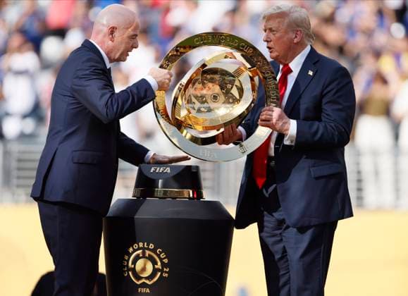 Chelsea FC v Paris Saint-Germain: Final - FIFA Club World Cup 2025 Fifa president Gianni Infantino and President of the USA Donald Trump lift the Club World Cup Trophy after the FIFA Club World Cup 2025 final match between Chelsea FC and Paris Saint-Germain at MetLife Stadium on July 13, 2025 in East Rutherford, United States. East Rutherford MetLife Stadium NJ United States Copyright: xRichardxSellers Sportsphoto APLx 14130943