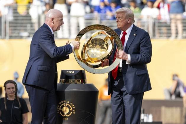 Chelsea beat PSG to win FIFA Club World Cup final NEW JERSEY, UNITED STATES - JULY 13: President of United States Donald Trump and FIFA President Gianni Infantino lift the trophy following the FIFA Club World Cup 2025 Final match between PSG and Chelsea at MetLife Stadium on July 13, 2025 in New Jersey. Mostafa Bassim Anadolu New Jersey United States. Editorial use only. Please get in touch for any other usage.  Copyright: x2025xAnadoluxMostafaxBassimx