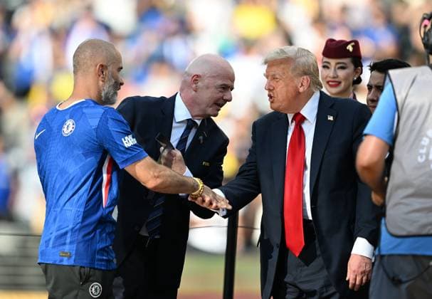 (250714) -- NEW JERSEY, July 14, 2025 -- U.S. President Donald Trump (C) greets Enzo Maresca (L), head coach of Chelsea FC during the awarding ceremony for the final match between Chelsea FC (England) and Paris Saint-Germain (France) at the FIFA Club World Cup 2025 at the MetLife Stadium, New Jersey, the United States, July 13, 2025. ) (SP)U.S.-NEW JERSEY-FOOTBALL-FIFA CLUB WORLD CUP-FINAL-CHELSEA FC VS PARIS SAINT-GERMAIN WuxXiaoling 