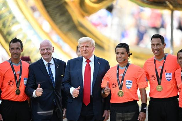 (250714) -- NEW JERSEY, July 14, 2025 -- U.S. President Donald Trump (C) and referees pose for photos during the awarding ceremony for the final match between Chelsea FC (England) and Paris Saint-Germain (France) at the FIFA Club World Cup 2025 at the MetLife Stadium, New Jersey, the United States, July 13, 2025. ) (SP)U.S.-NEW JERSEY-FOOTBALL-FIFA CLUB WORLD CUP-FINAL-CHELSEA FC VS PARIS SAINT-GERMAIN WuxXiaoling 