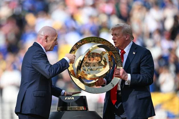(250714) -- NEW JERSEY, July 14, 2025 -- U.S. President Donald Trump (R) and FIFA president Gianni Infantino hold the trophy during the awarding ceremony for the final match between Chelsea FC (England) and Paris Saint-Germain (France) at the FIFA Club World Cup 2025 at the MetLife Stadium, New Jersey, the United States, July 13, 2025. ) (SP)U.S.-NEW JERSEY-FOOTBALL-FIFA CLUB WORLD CUP-FINAL-CHELSEA FC VS PARIS SAINT-GERMAIN WuxXiaoling 