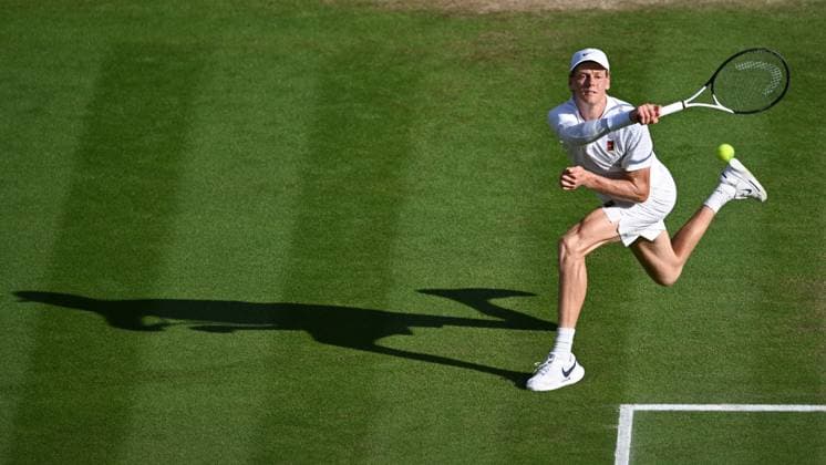 (250714) -- LONDON, July 14, 2025 -- Jannik Sinner hits a return during the men s singles final between Carlos Alcaraz of Spain and Jannik Sinner of Italy at the Wimbledon Tennis Championships in London, Britain, July 13, 2025. ) (SP)BRITAIN-LONDON-TENNIS-WIMBLEDON-MEN S SINGLES-FINAL ZhaoxDingzhe 