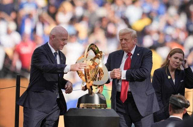 (250714) -- NEW JERSEY, July 14, 2025 -- U.S. President Donald Trump (2nd R) and FIFA president Gianni Infantino (L) prepare to hold the trophy during the awarding ceremony for the final match between Chelsea FC (England) and Paris Saint-Germain (France) at the FIFA Club World Cup 2025 at the MetLife Stadium, New Jersey, the United States, July 13, 2025. ) (SP)U.S.-NEW JERSEY-FOOTBALL-FIFA CLUB WORLD CUP-FINAL-CHELSEA FC VS PARIS SAINT-GERMAIN XuxChang 