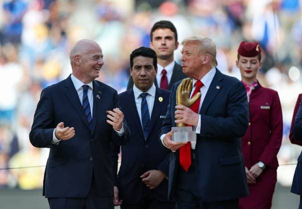 (250714) -- NEW JERSEY, July 14, 2025 -- U.S. President Donald Trump (2nd R) holds the golden glove trophy during the awarding ceremony for the final match between Chelsea FC (England) and Paris Saint-Germain (France) at the FIFA Club World Cup 2025 at the MetLife Stadium, New Jersey, the United States, July 13, 2025. ) (SP)U.S.-NEW JERSEY-FOOTBALL-FIFA CLUB WORLD CUP-FINAL-CHELSEA FC VS PARIS SAINT-GERMAIN LixMing 